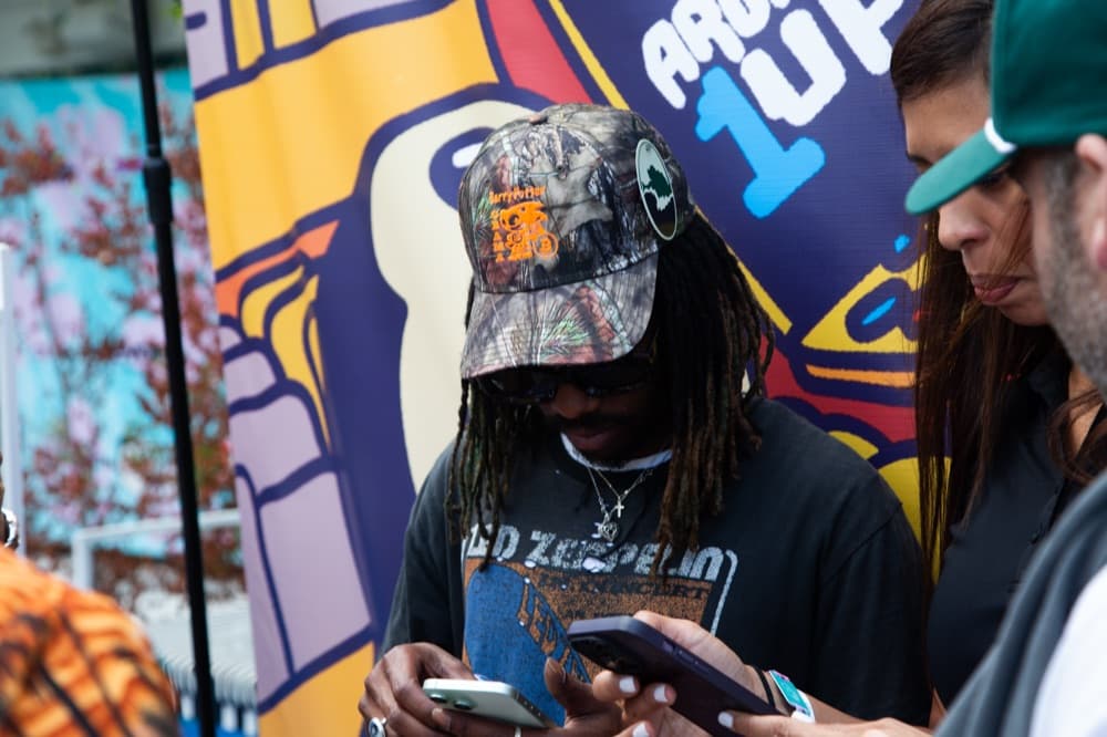 An attendee at a branded activation booth