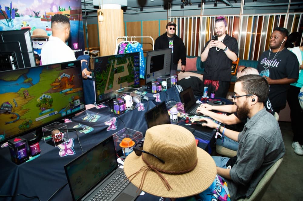 Attendees playing games together at a lounge activation